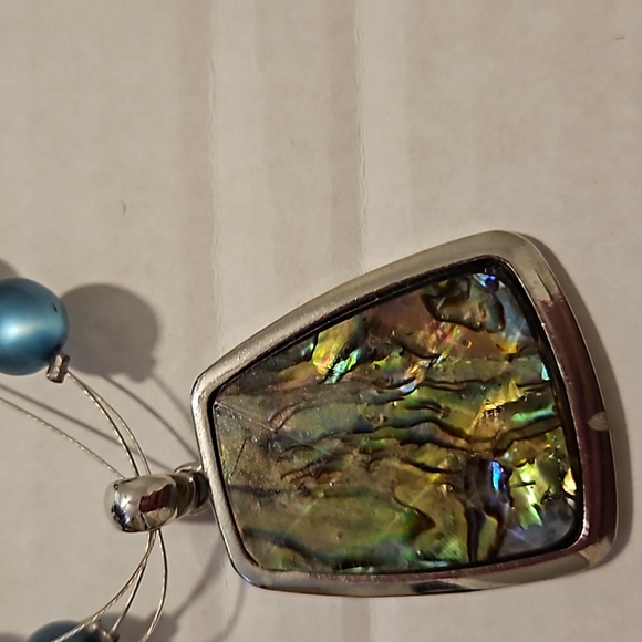 Green and silver necklace. Adjustable size. Great way to dress up an old outfit. - Picture 2 of 7